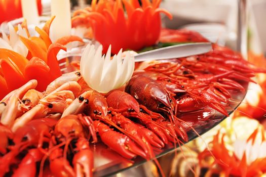 beautifully decorated dish with fresh boiled lobster and crabs