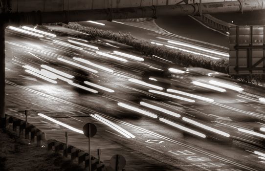 Beautiful urban traffic scenes of cars and lights motion blurred.