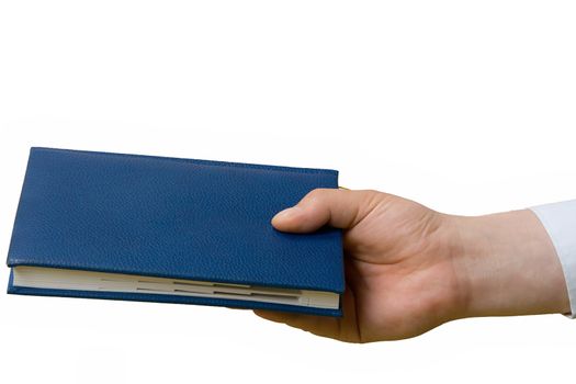 Hand transferring a notebook. Isolated. Close up.