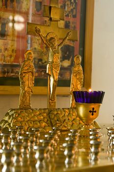 Jesus Christ's crucifixion. A burning candle.