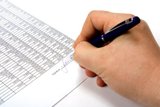 Hand signing the document.