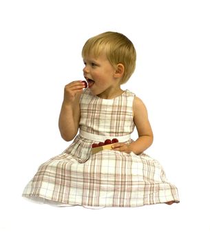 Girl eating raspberries, isolated on white background