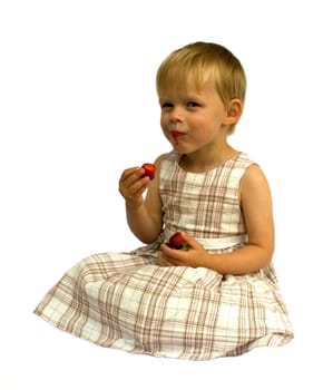 Girl eating strawberries, isolated on white background