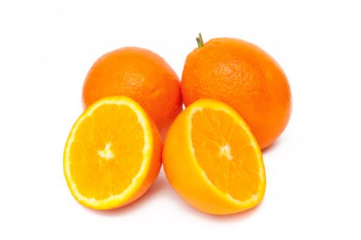 Fresh oranges on the white background