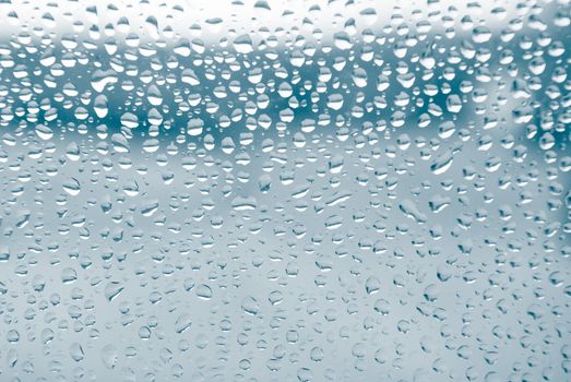 rain drops on glass textured background,Close-up