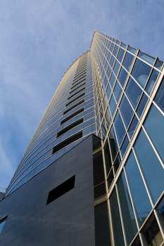 Business glass skyscraper building in perspective view