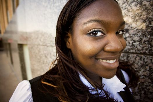 Closeup of a pretty African American woman with braids