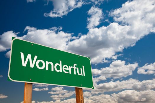 Wonderful Green Road Sign with Dramatic Clouds and Sky - The Kudos Sign Series.