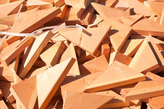 Pile of Building Lumber Scraps at Construction Site.