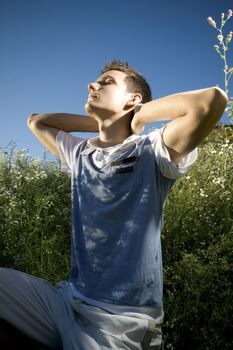 Young man stretching his body.