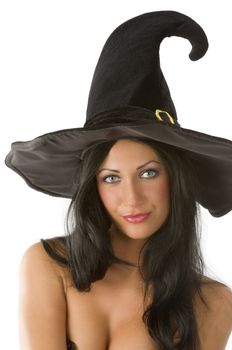 nice portrait of pretty and young brunette with blue eyes and witch hat