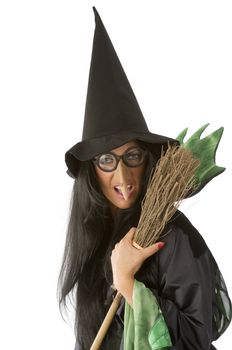 big nose and glasses as an old ugly witch keeping a broom