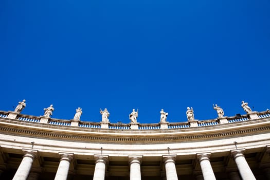 Famous colonnade of St. Peter's Basilica in Vatican, Rome, Italy