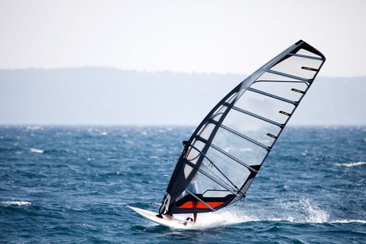 A wind surfer on the ocean