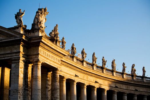 Famous colonnade of St. Peter's Basilica in Vatican, Rome, Italy
