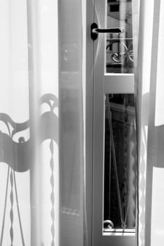 Black and white picture of balcony in living room