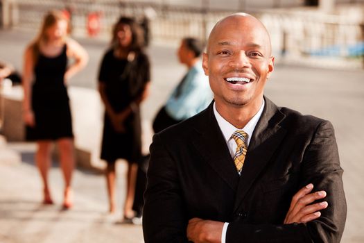 An portrait of an African American Business Man in an outdoor setting