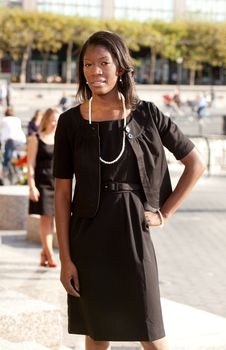 A portrait of an African American business woman outdoors