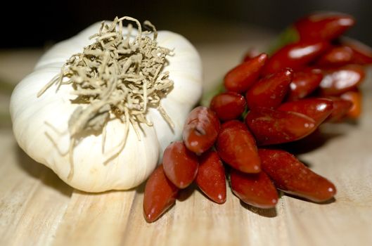 close up shot of garlic and chili pepper ingredients