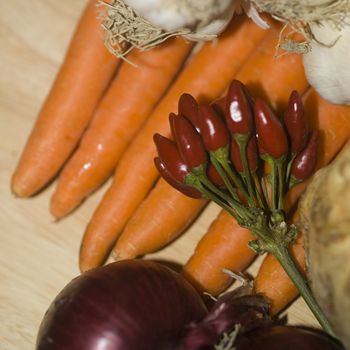 close up shot of garlic and chili pepper ingredients