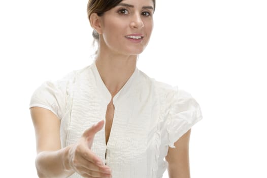 young woman offering hand shake against white background