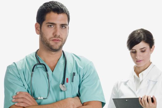 handsome doctor and pretty nurse against white background