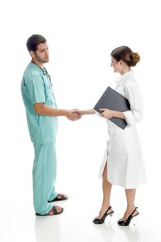 medical professionals shaking hands against white background