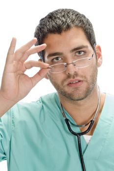 doctor holding spectacles with white background
