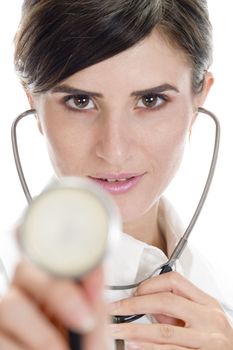 lady doctor posing with stethoscope on an isolated background