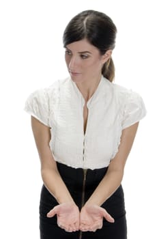 young lady showing her palms against white background