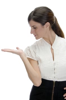 young lady looking her palm on an isolated white background
