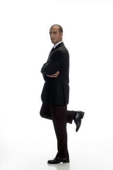 young businessman standing on one leg with white background
