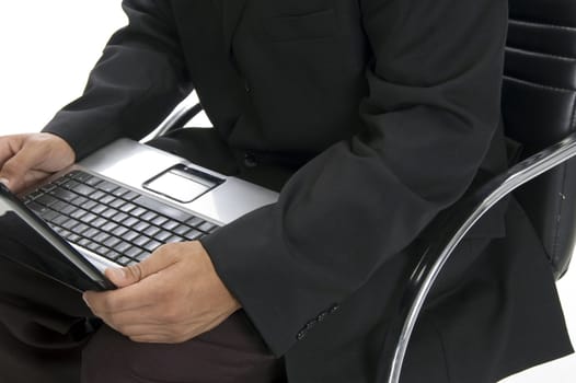 male hands typing an a laptop close up with white background