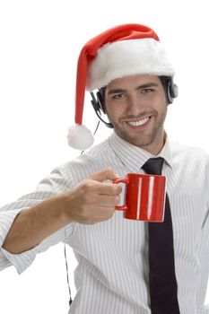 young man enjoying coffee and wearing santa cap isolated on white background
