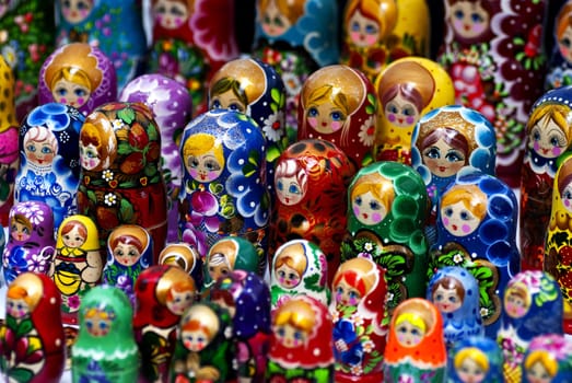 Several babushka dolls in differend colors and sizes