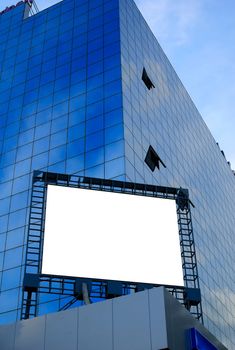 giant blank billboard, display on a skyscraper in a big city for advertising