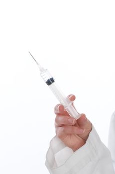 An image of a female doctor holding a medical syringe