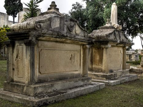 Details in HDR of a 19th century graveyard in Malta