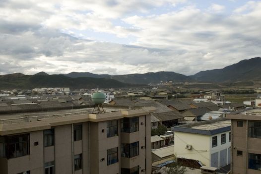 Famous and mysterious town Shangrila in Yunnan province, China surrounded by Sino-Tibetan mountains.