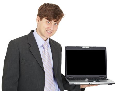 Friendly smiling person holds the laptop on a hand isolated on white