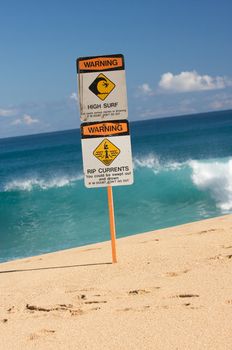 Surf and Currents Warning Sign on a beach in Hawaii