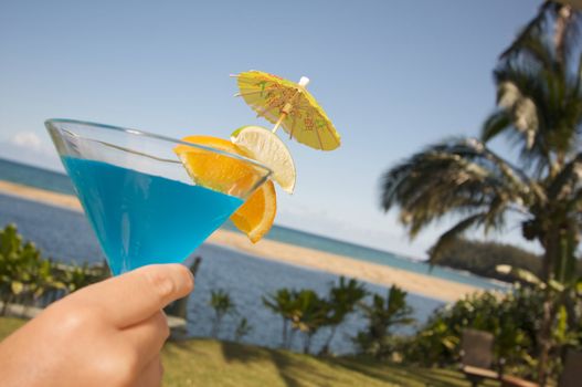 Woman with Tropical Drinks on Lanai