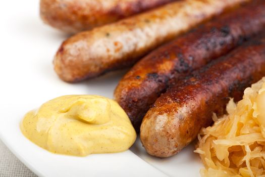 fried sausages,mustard and sauerkraut