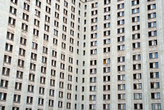 corner of a wall with a lot of windows