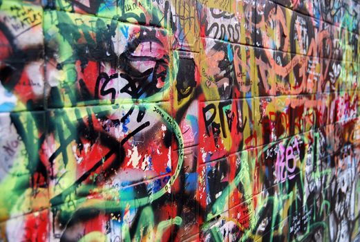 the wall with colorful graffiti with the perspective