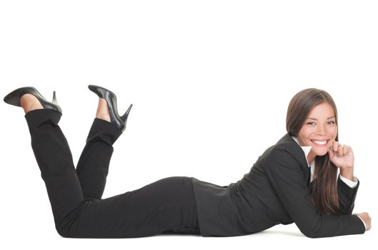 Business woman lying down on floor isolated on white smiling looking at camera. Young mixed race Chinese Asian Caucasian businesswoman.
