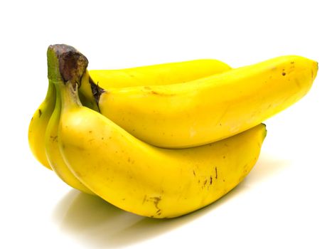 Ripe bananas on the white background. Shallow DOF