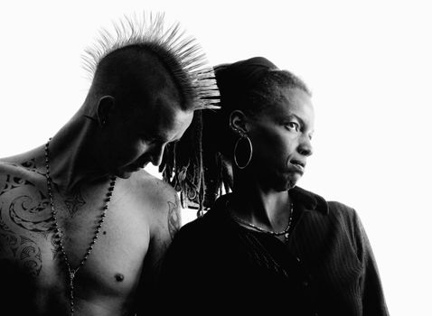 Man with Mohawk and Woman wearing Dreadlocks