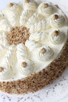Cream cake with almond edge - close-up