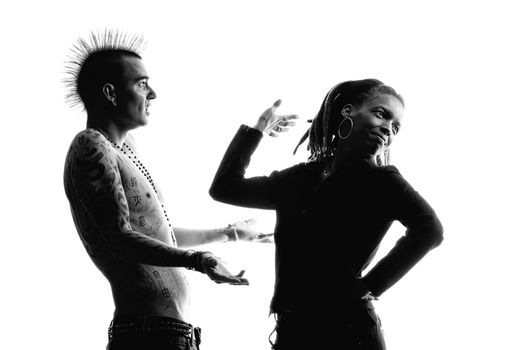 Man with Mohawk and Woman wearing Dreadlocks